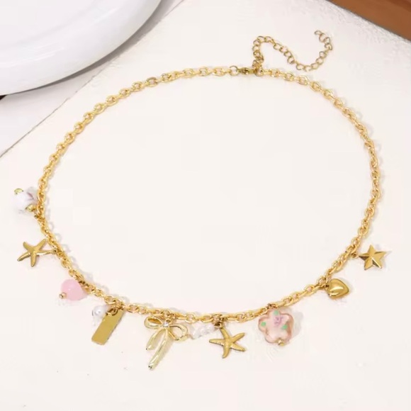 Stainless Steel Starfish Flower bow Charm Pendant Golden Color Necklace - Picture 3 of 3